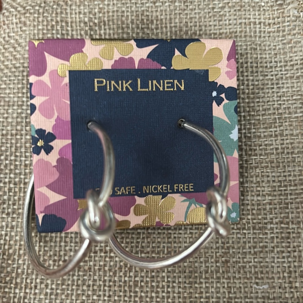 Silver knotted hoops earrings. NWT